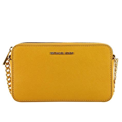 michael kors yellow clutch|Michael Kors women's gold clutch.